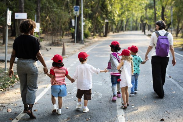 Little Kids with Teacher Walking Together Field Trip